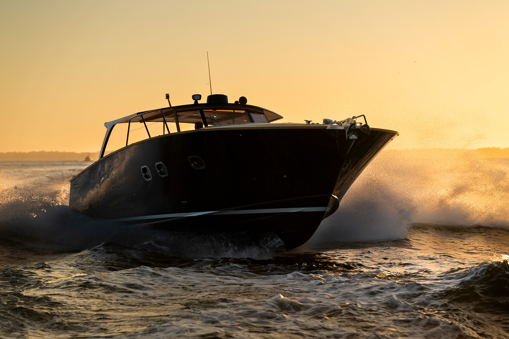 ‘Chaloupe’ at sea at sunset